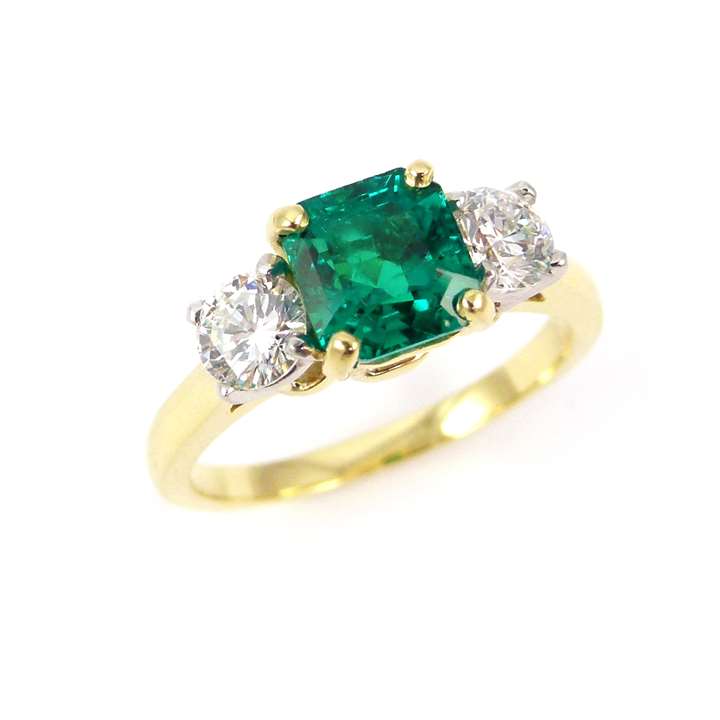 Square cut emerald and diamond three stone ring